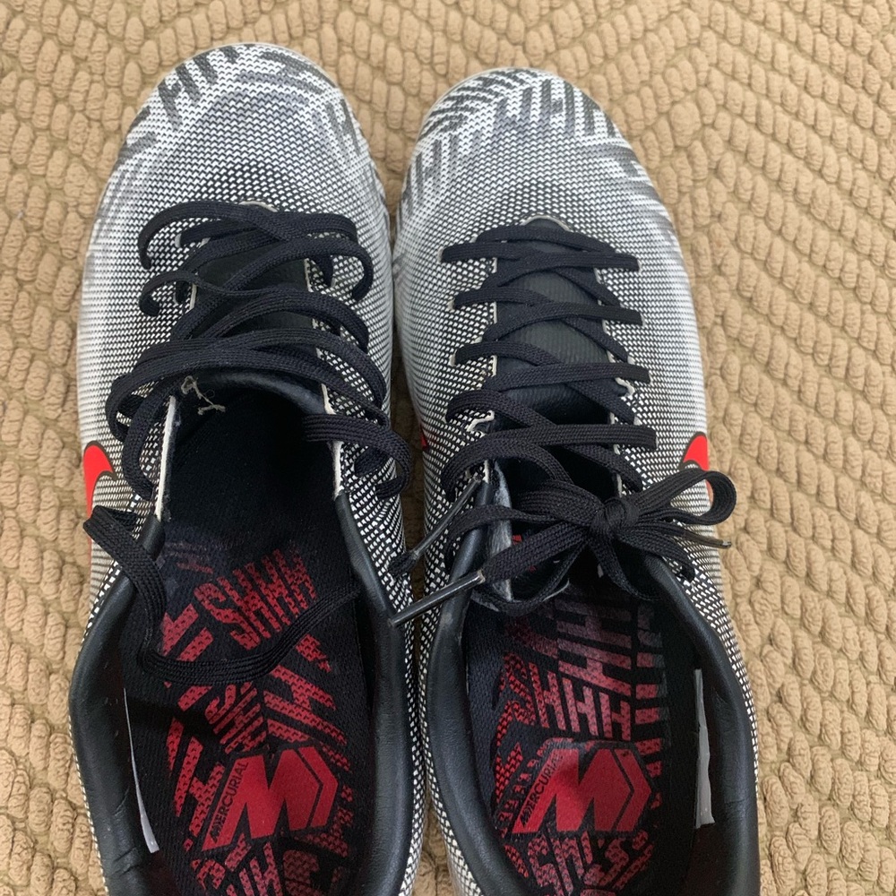 Black and White Athletic Shoes with Red Accents